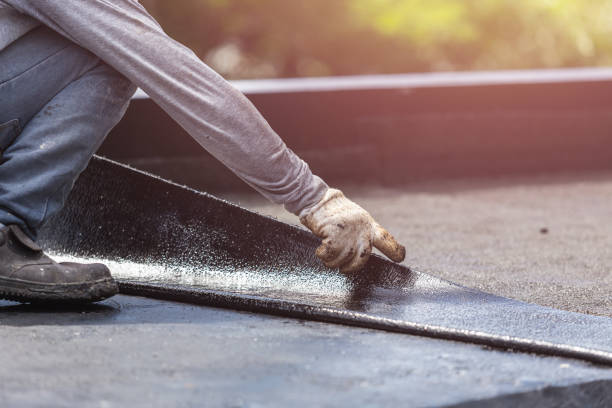 Professional Waterproofing technician working in Keuka Park, NY